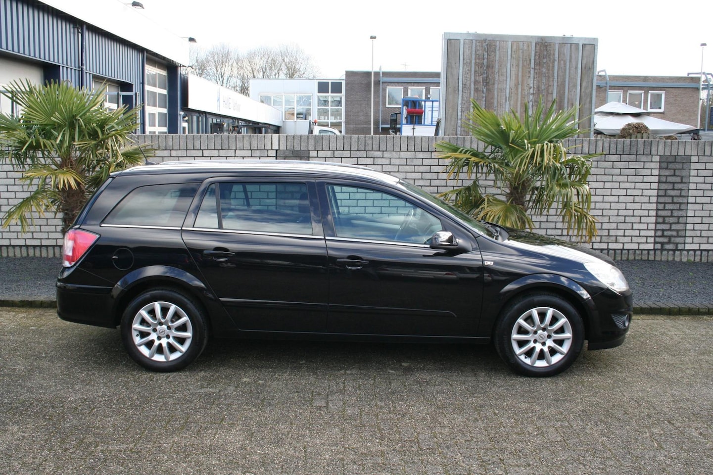 Opel Astra Wagon - 1.6 Cosmo airco, navi, leder - AutoWereld.nl