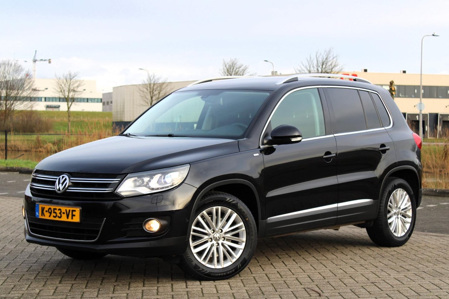 Volkswagen Tiguan - 1.4 TSI Sport l Airco l Navi l Stoelverw - AutoWereld.nl