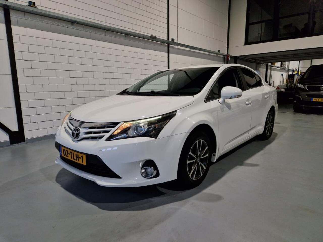 Toyota Avensis - 1.8 Navi Trekhaak PDC Clima Cruise Camera - AutoWereld.nl