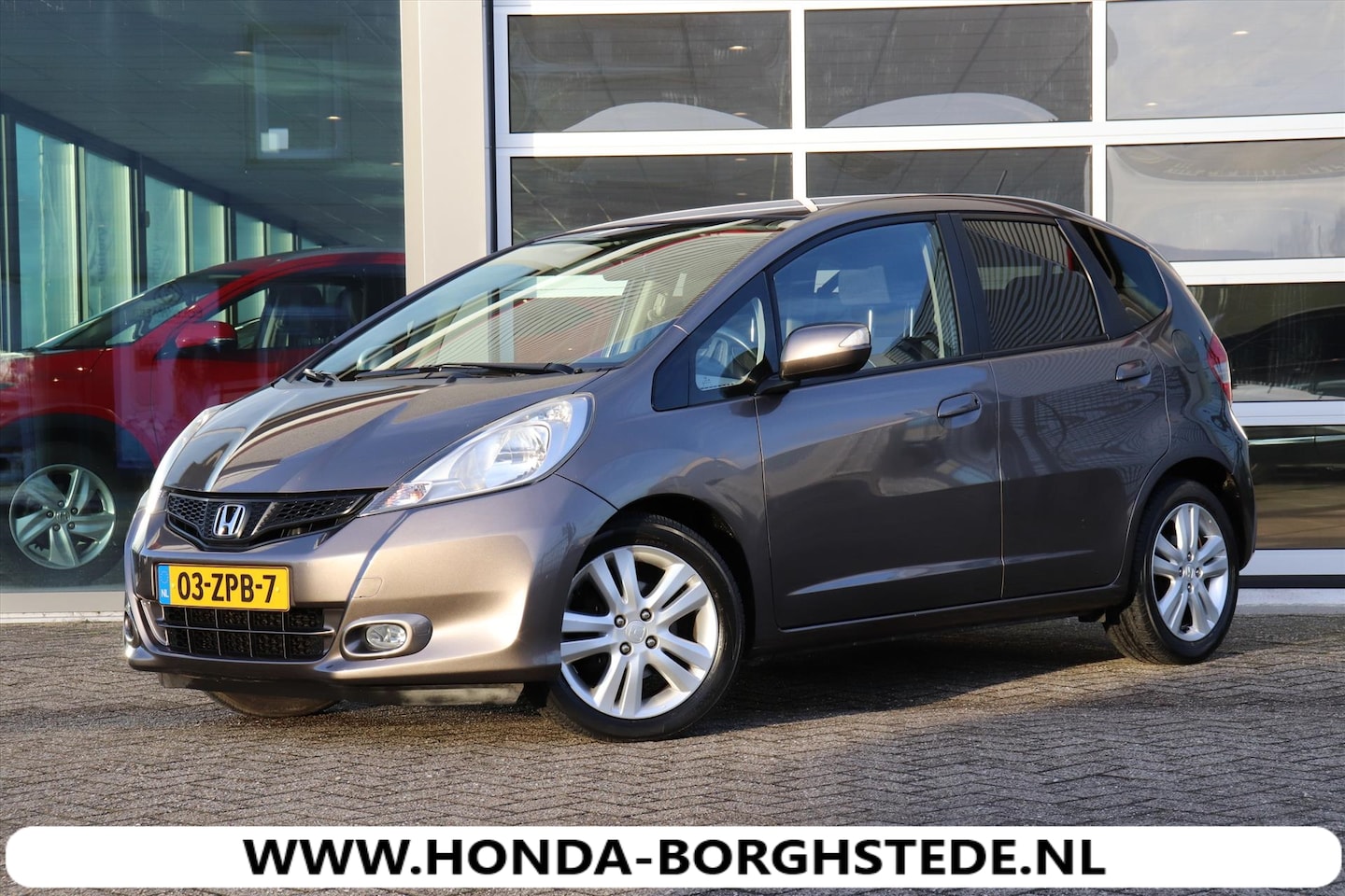 Honda Jazz - 1.4 i-VTEC 100pk COMFORT PLUS NAVI - AutoWereld.nl