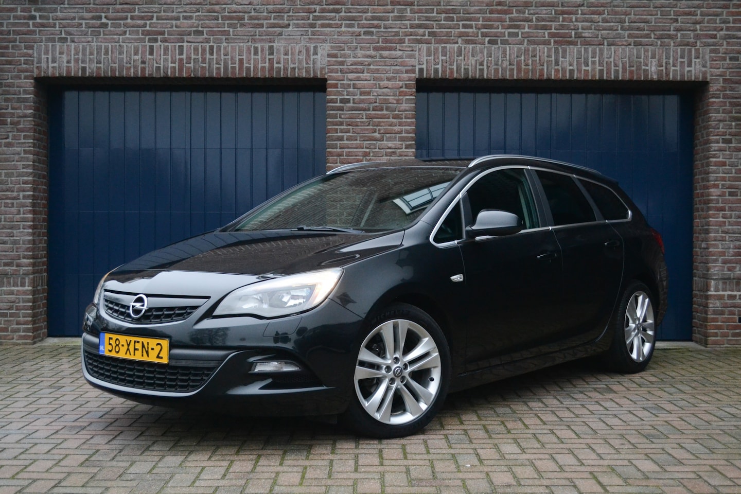 Opel Astra Sports Tourer - 1.4 Turbo Cosmo Sport | Trekhaak | Clima | Cruise | Parkeersensoren - AutoWereld.nl