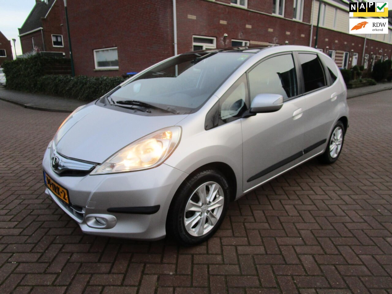 Honda Jazz - 1.4 Hybrid Elegance nieuwstaat lm clima pano, pdc - AutoWereld.nl