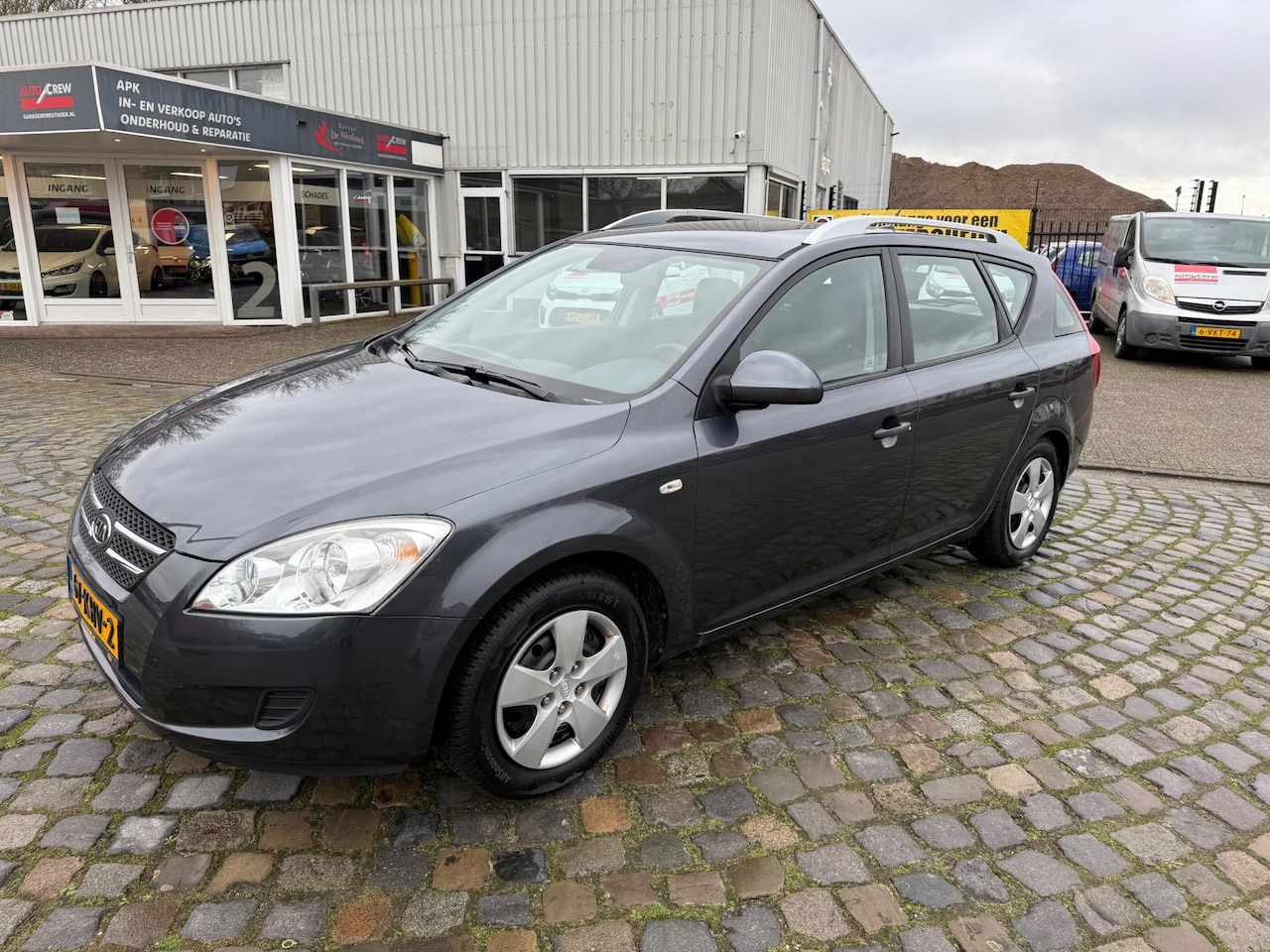 Kia Cee'd Sporty Wagon - 1.4 CVVT X-tra 1.4 CVVT X-tra - AutoWereld.nl