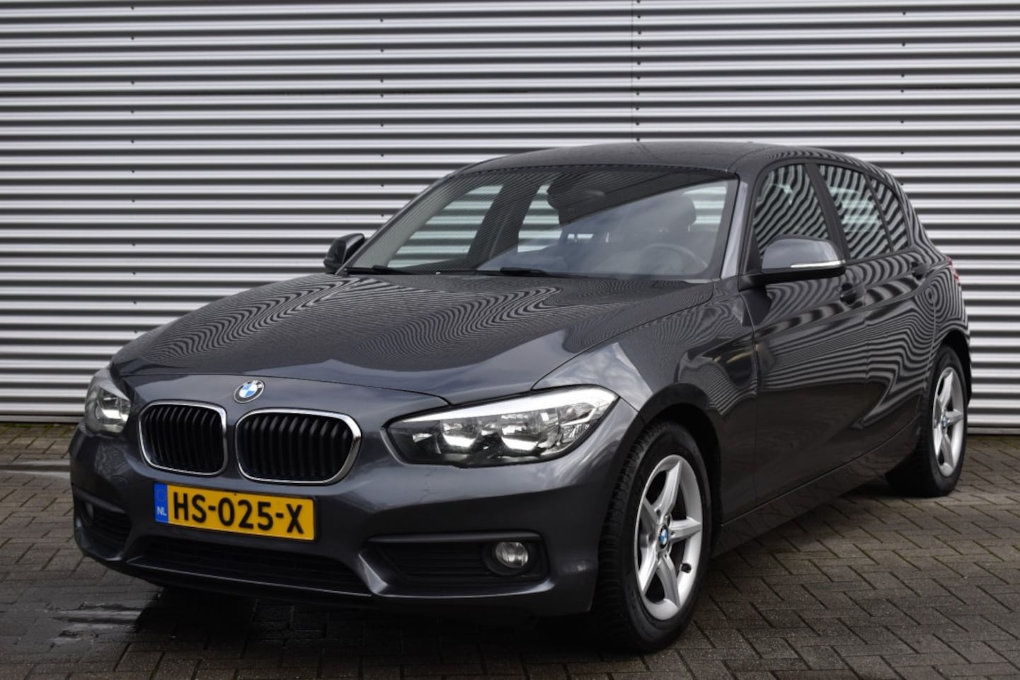 BMW 1-serie - 118I AUT. NAVI / PDC / ECC / TREKHAAK - AutoWereld.nl