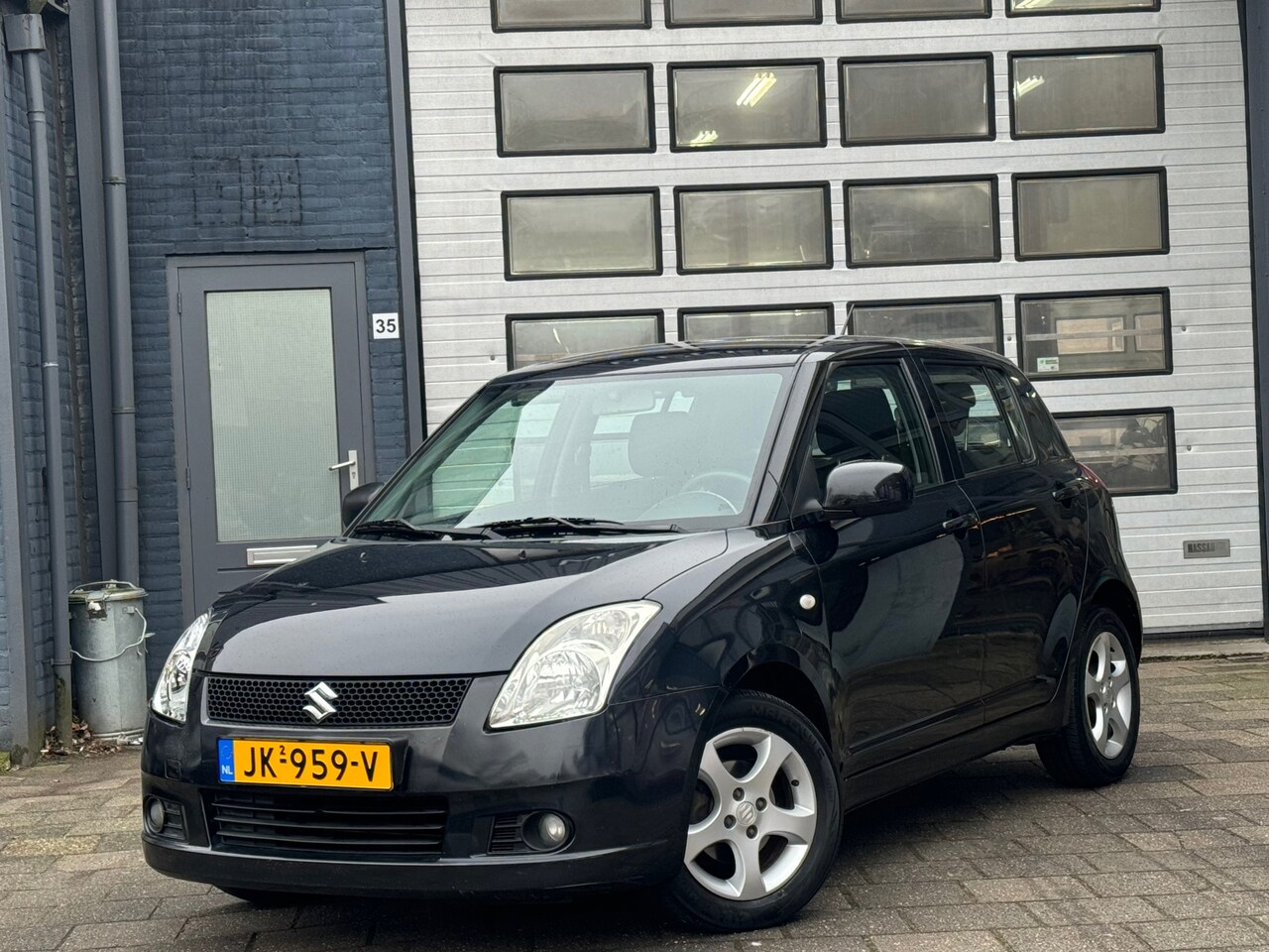 Suzuki Swift - 1.3 4Grip Exclusive | Airco | LMV | 5-DRS - AutoWereld.nl