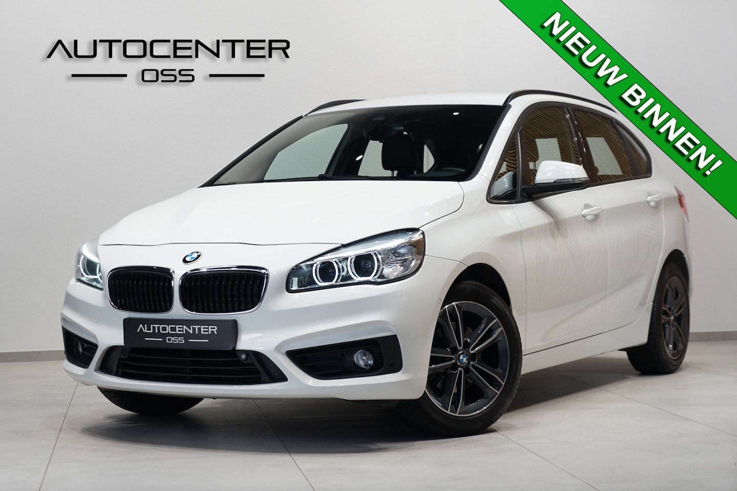 BMW 2-serie Active Tourer - 218i Executive Automaat ✅ AFN.TREKHAAK ✅ LEDER ✅ ELEK.KLEP ✅ NAVI ✅ H&K ✅ CRUISE - AutoWereld.nl