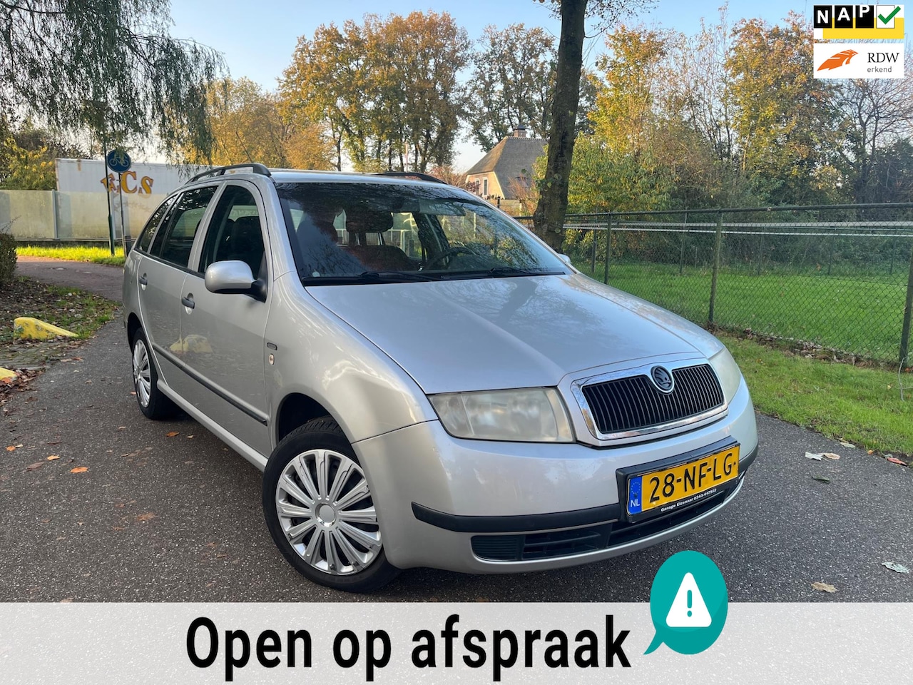 Skoda Fabia Combi - 1.4-16V Creation | Stationwagen | NAP + APK | Airco + Cruise control + Trekhaak - AutoWereld.nl