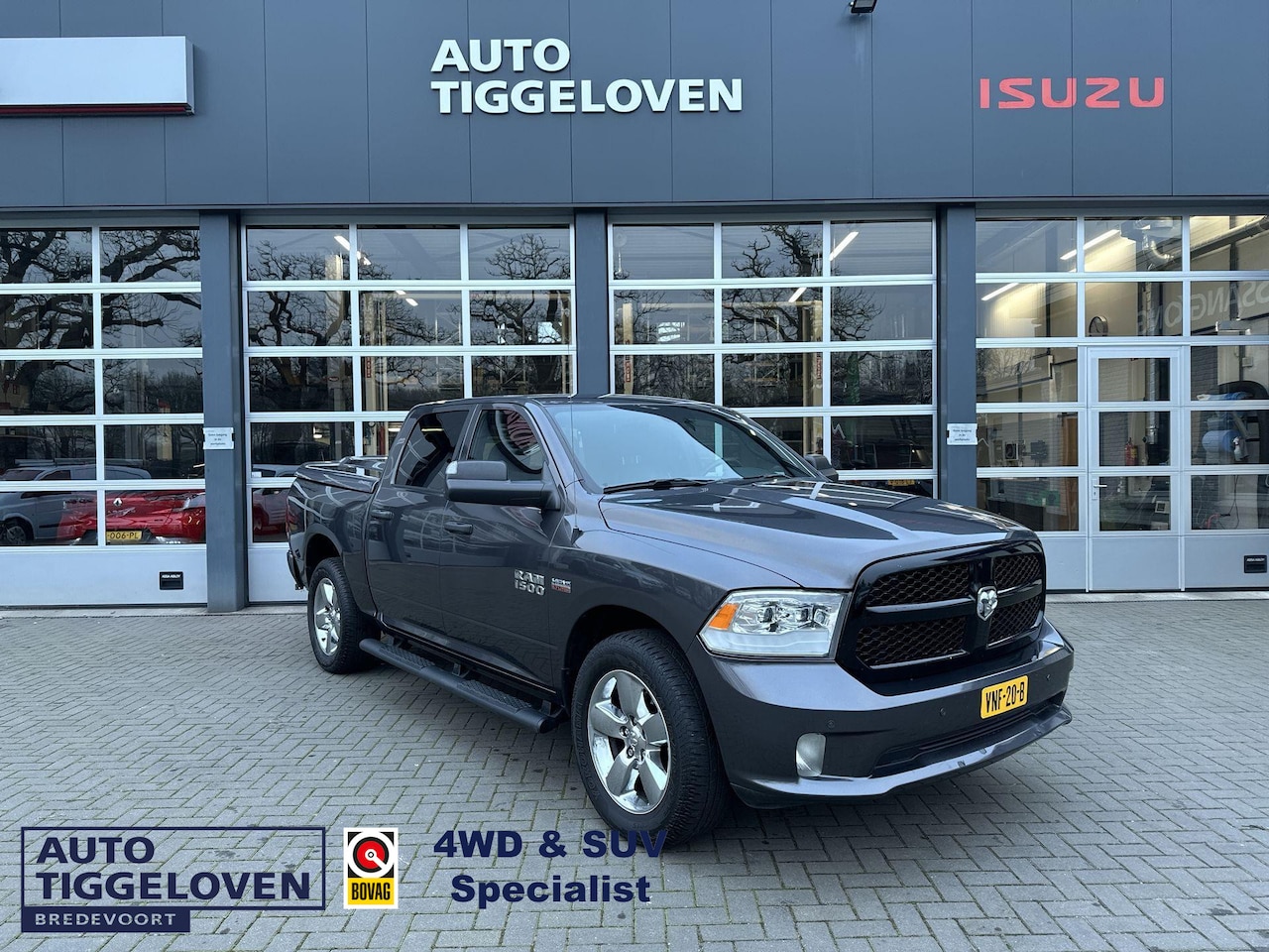 Dodge Ram 1500 - 5.7 V8 4x4 Quad Cab 6'4 Laramie LPG Automaat Trekhaak - AutoWereld.nl