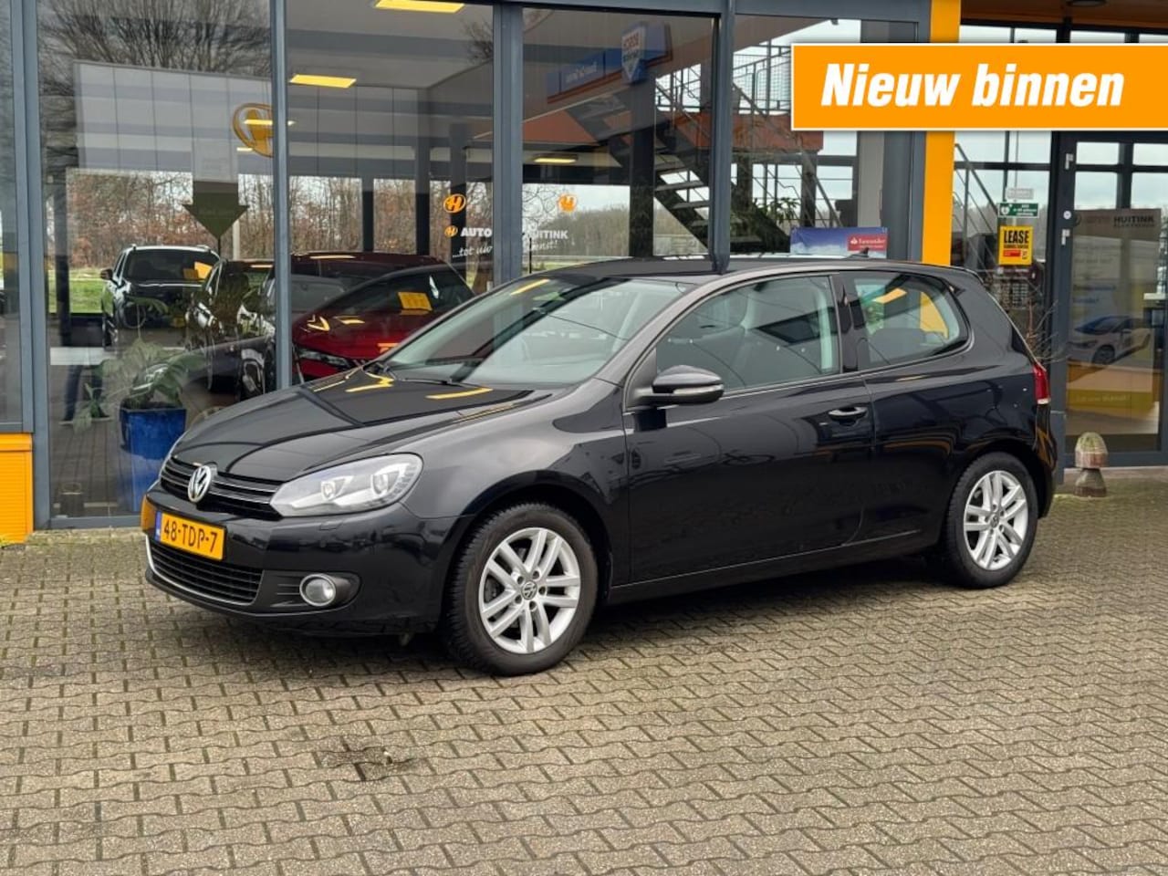 Volkswagen Golf - 1.2 TSI Highline Bluemotion - bi-xenon - navi - sensoren - AutoWereld.nl