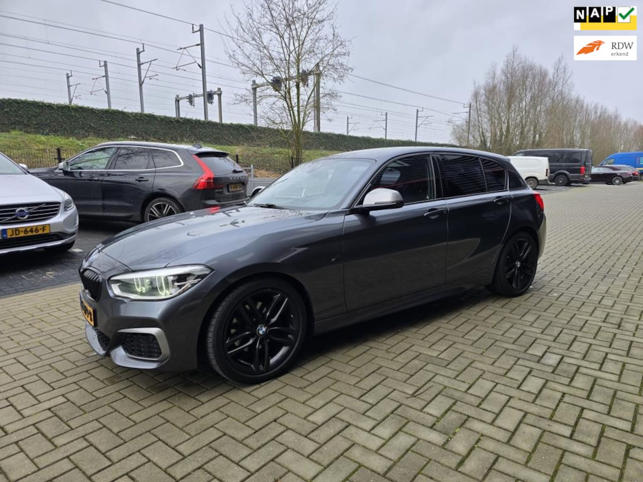 BMW 1-serie - 120d M Pakket Sport / AUTOMAAT / FLIPPERS / FULL TOP AUTO! - AutoWereld.nl