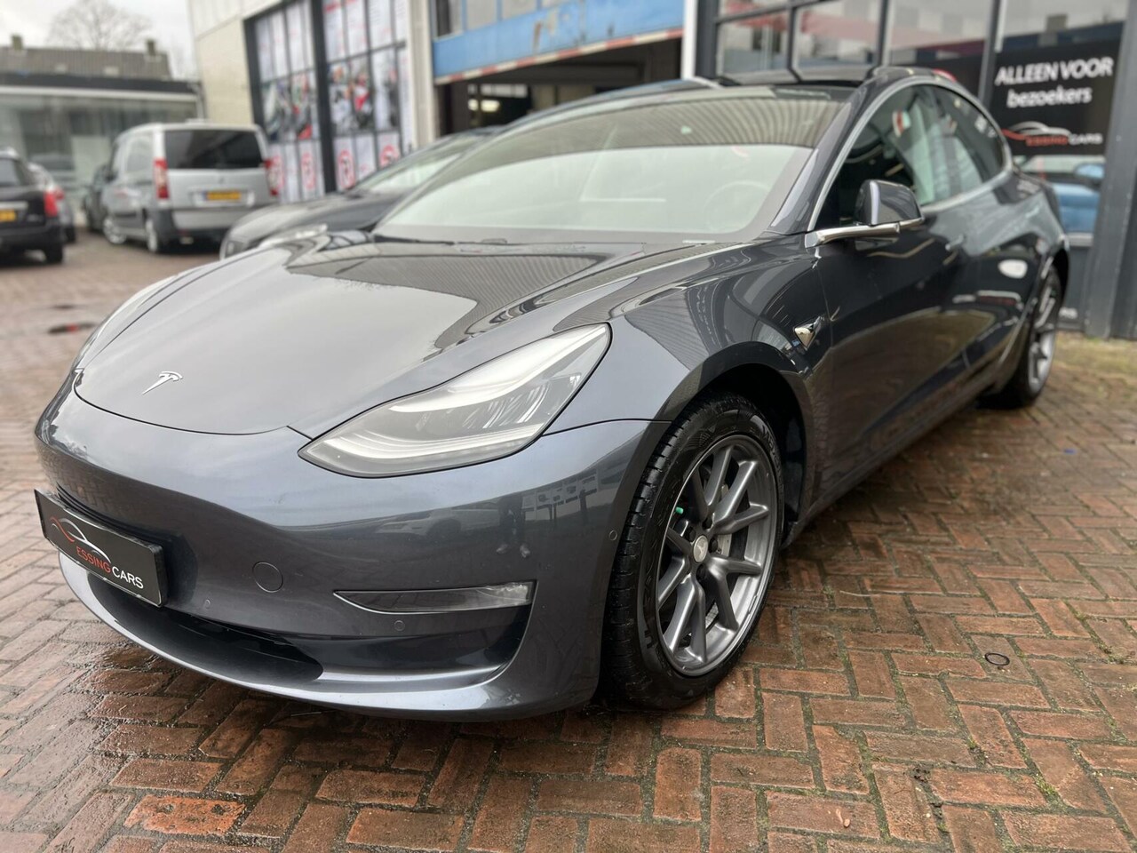 Tesla Model 3 - Long Range RWD Long Range AWD FSD achterbank verwarming - AutoWereld.nl