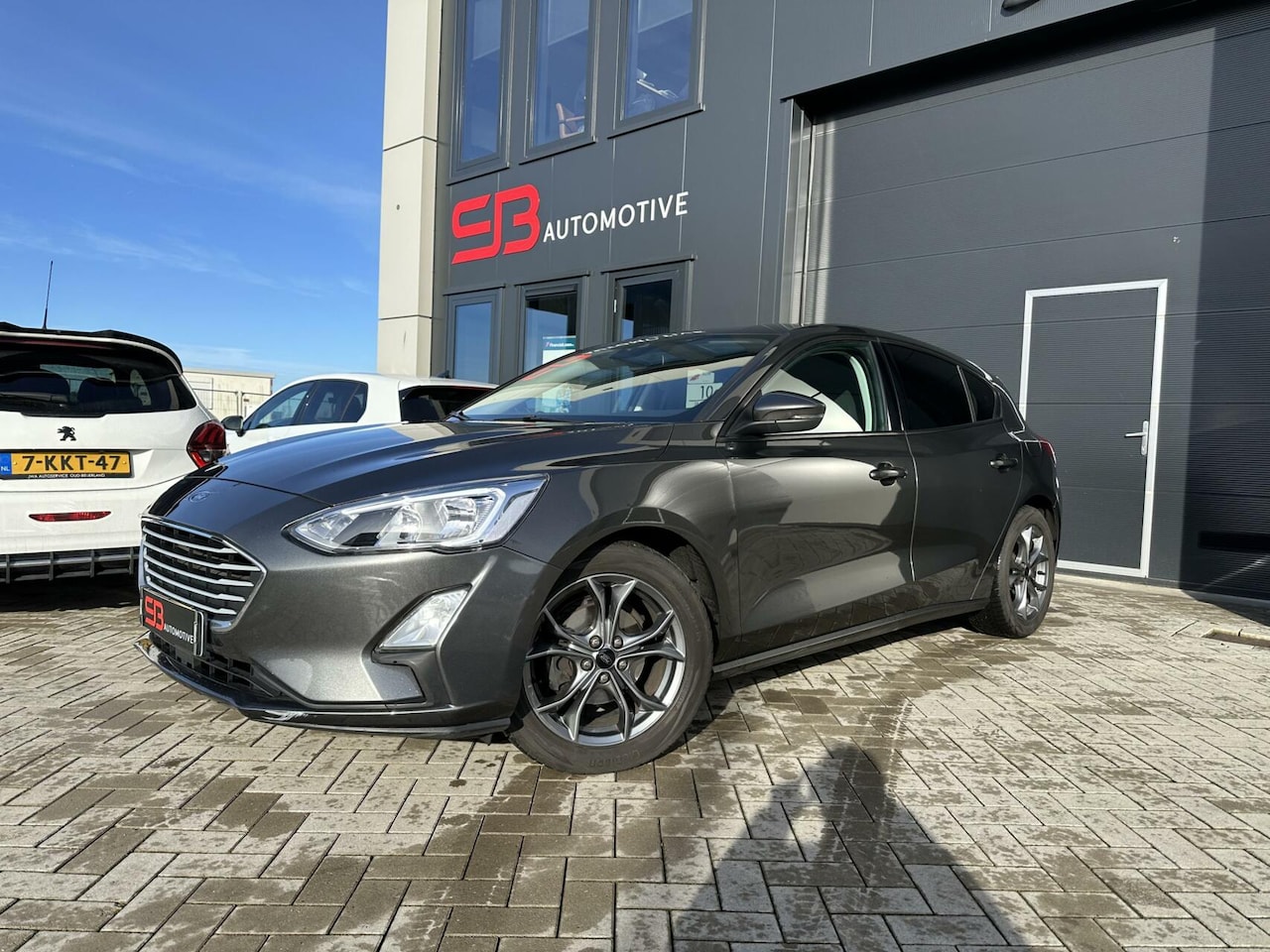 Ford Focus - 1.0 EcoBoost Titanium Business 17 inch Stoelverw. - AutoWereld.nl