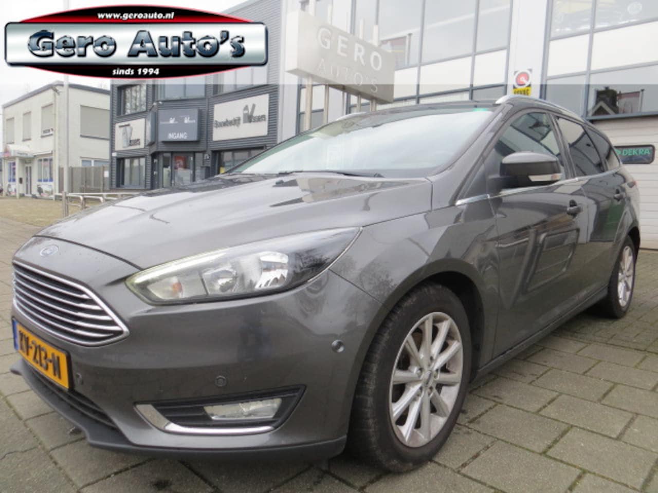 Ford Focus Wagon - 1.0 Titanium station vol opties ,oa airco ecc ,stuurverwarming etc - AutoWereld.nl