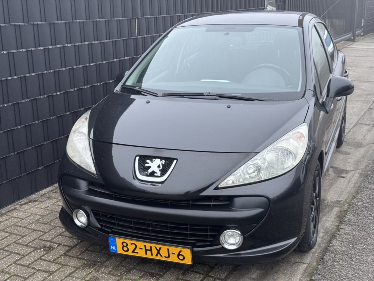 Peugeot 207 - 1.4 VTi Look| CRUISE| AIRCO| 5DRS| ZWART| NAP| LM - AutoWereld.nl