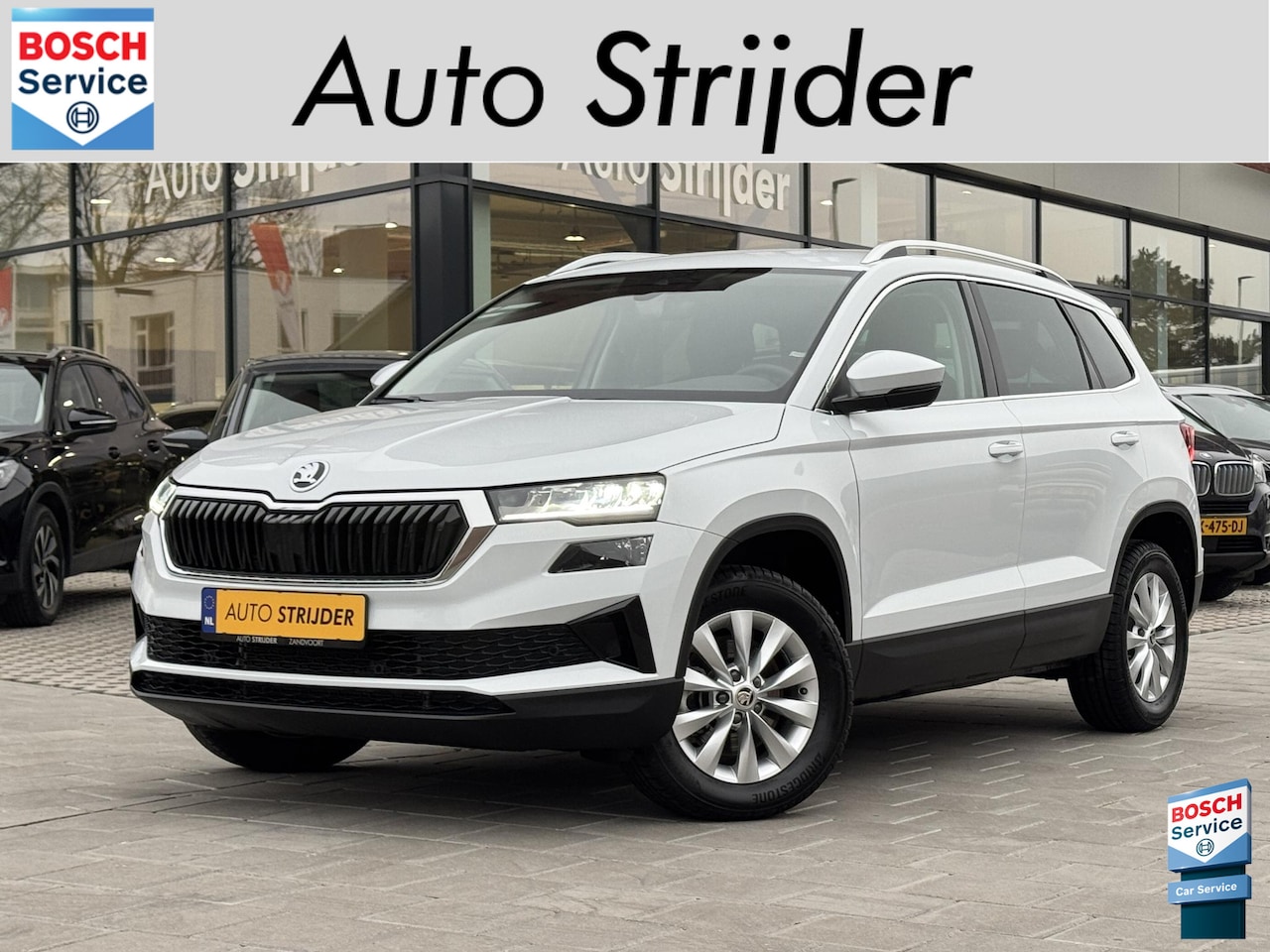 Skoda Karoq - 1.5 TSI ACT Business Edition 150pk automaat | ECC | Camera | Carplay | 16LM - AutoWereld.nl