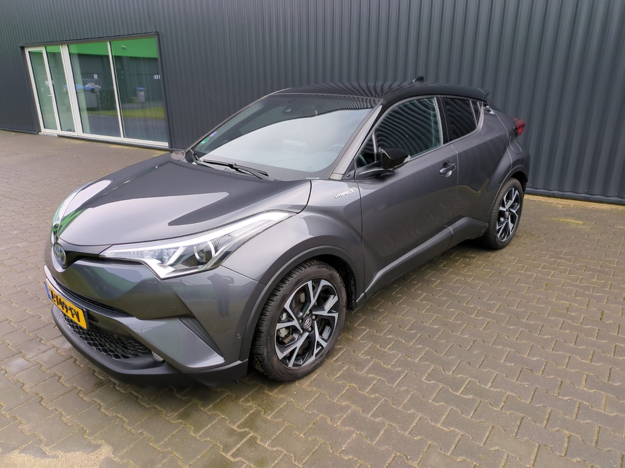 Toyota C-HR - 1.8 Hybrid Executive Ultimate HELE NETTE BOMVOLLE AUTO - AutoWereld.nl