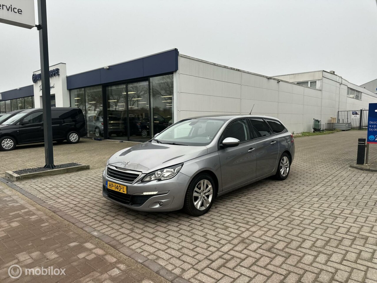 Peugeot 308 SW - 1.6 BlueHDI Blue Lease Executive Pano Clima - AutoWereld.nl