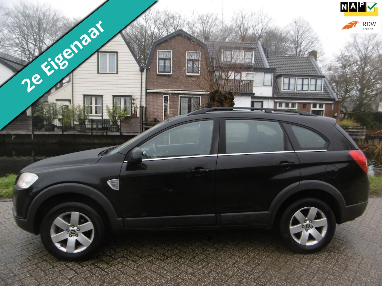 Chevrolet Captiva - 2.4i Style 2WD 7-Persoons 2e eig. Trekhaak 1500kg Airco - AutoWereld.nl