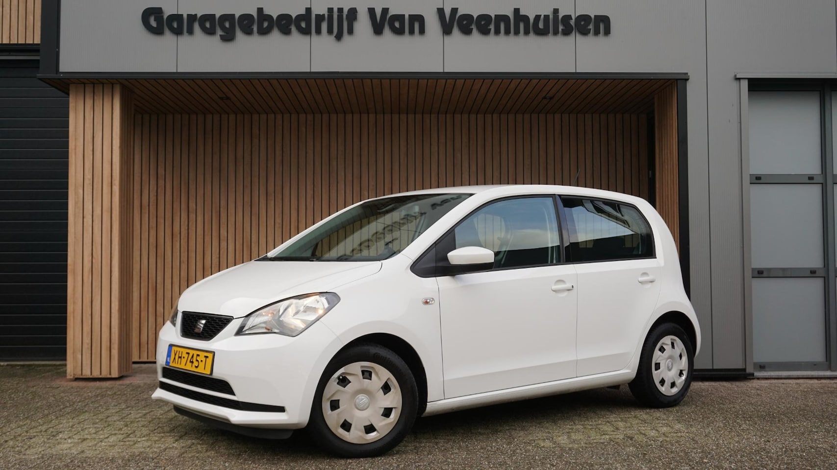 Seat Mii - 1.0 60pk 5Drs Style Airco Elek.pakket Bluetooth *NL auto* 62246km! - AutoWereld.nl