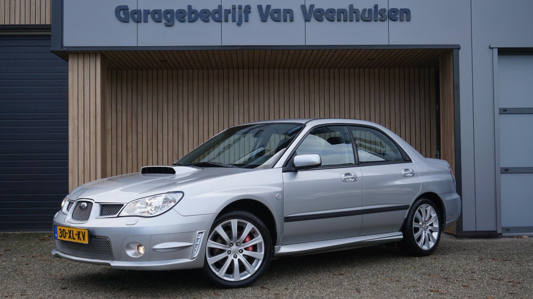 Subaru Impreza - 2.5 230pk WRX Edition Xenon 17inch LM Cruise Control Clima NL auto! 98382km Volledig Subar - AutoWereld.nl