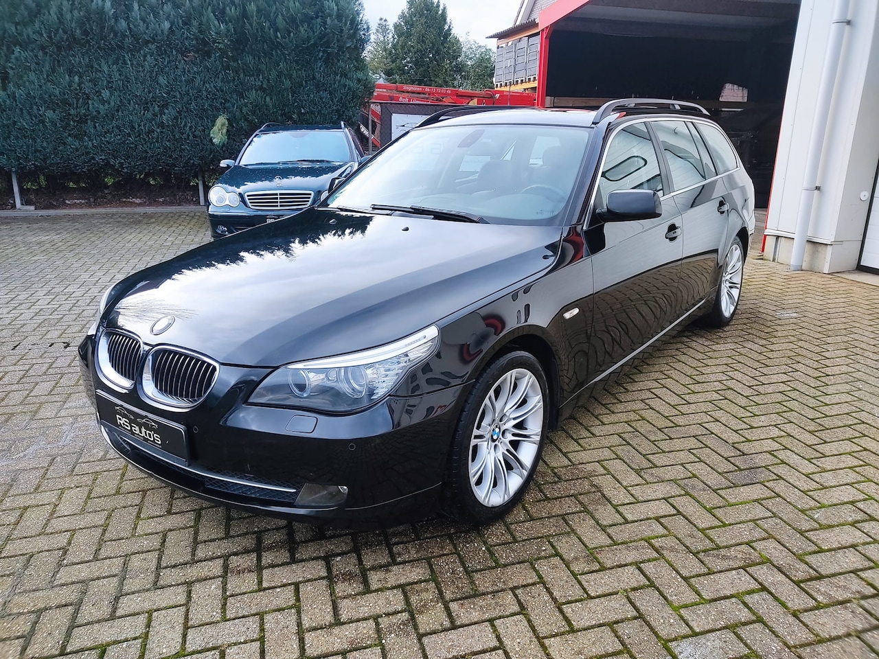 BMW 5-serie Touring - 523i Business Line Edition II 5-serie E61 2009 panorama, trekhaak, leder, xenon - AutoWereld.nl