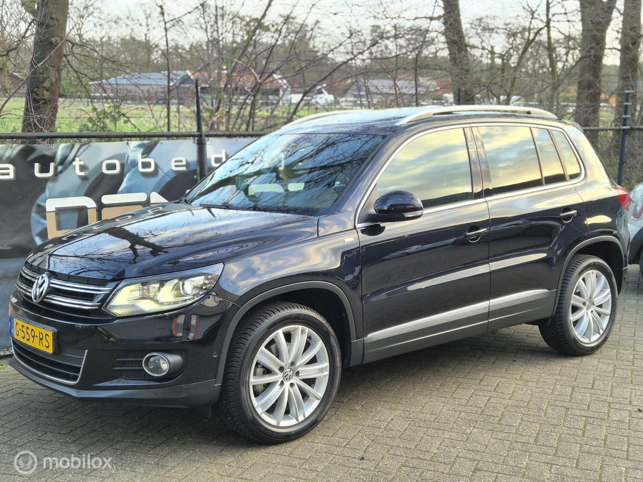 Volkswagen Tiguan - 2.0 TDI Sport&Style 4Motion AUT 177PK | PANO | CAMERA | PDC | 18'' | STOEL V. | 150.000 KM - AutoWereld.nl