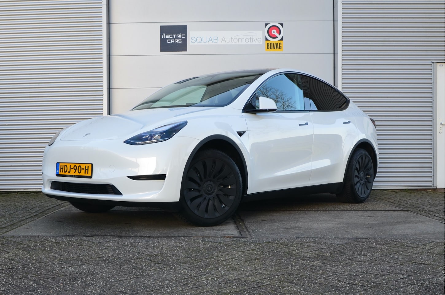 Tesla Model Y - RWD 58 kWh AutoPilot, Warmtepomp, LFP accu dus 100% Opladen - AutoWereld.nl