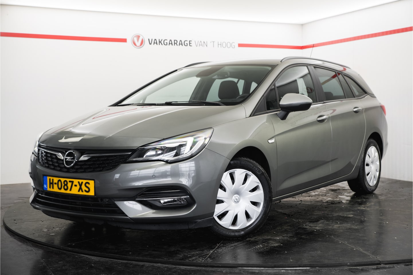 Opel Astra Sports Tourer - 1.2 Business Edition Navi,Trekhaak,Cruise c,Lm velgen - AutoWereld.nl