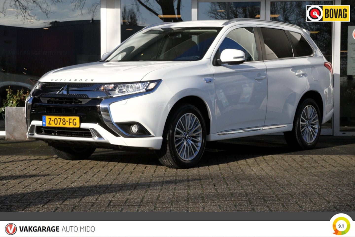 Mitsubishi Outlander - 2.4 PHEV Intense 4WD -Trekhaak- -Stand kachel- - AutoWereld.nl