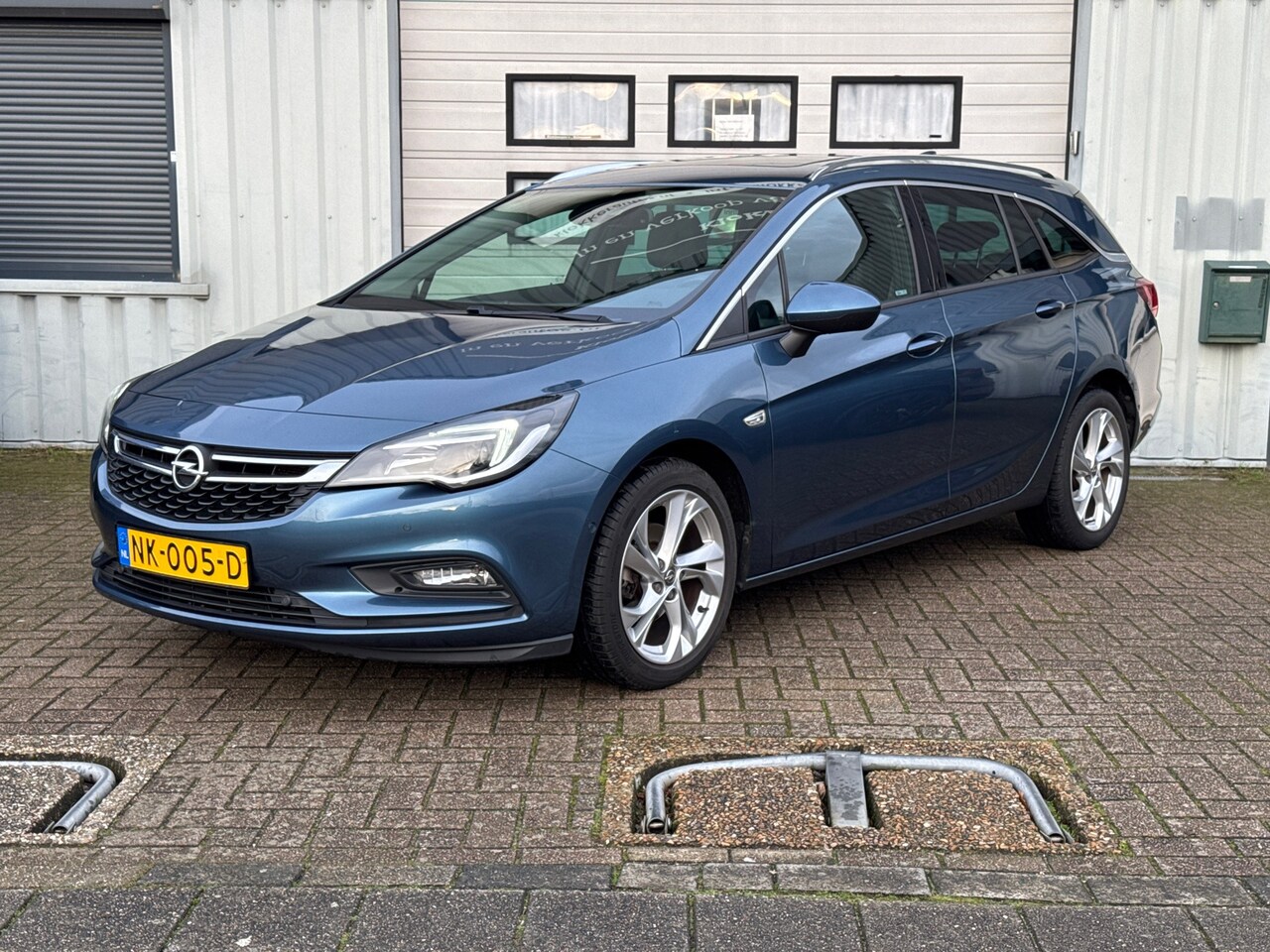 Opel Astra Sports Tourer - 1.4 Innovation AUT. | Leder | Schuifdak | 1E EIG | Dealer ondh. - AutoWereld.nl