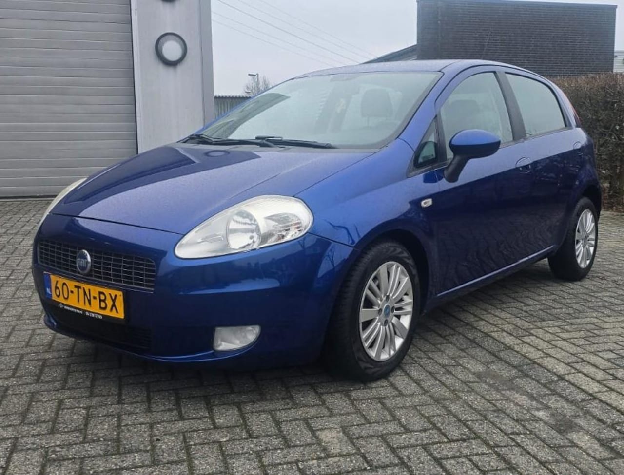 Fiat Grande Punto - 1.4 Edizione Blue & Me 1.4 Edizione Blue & Me - AutoWereld.nl