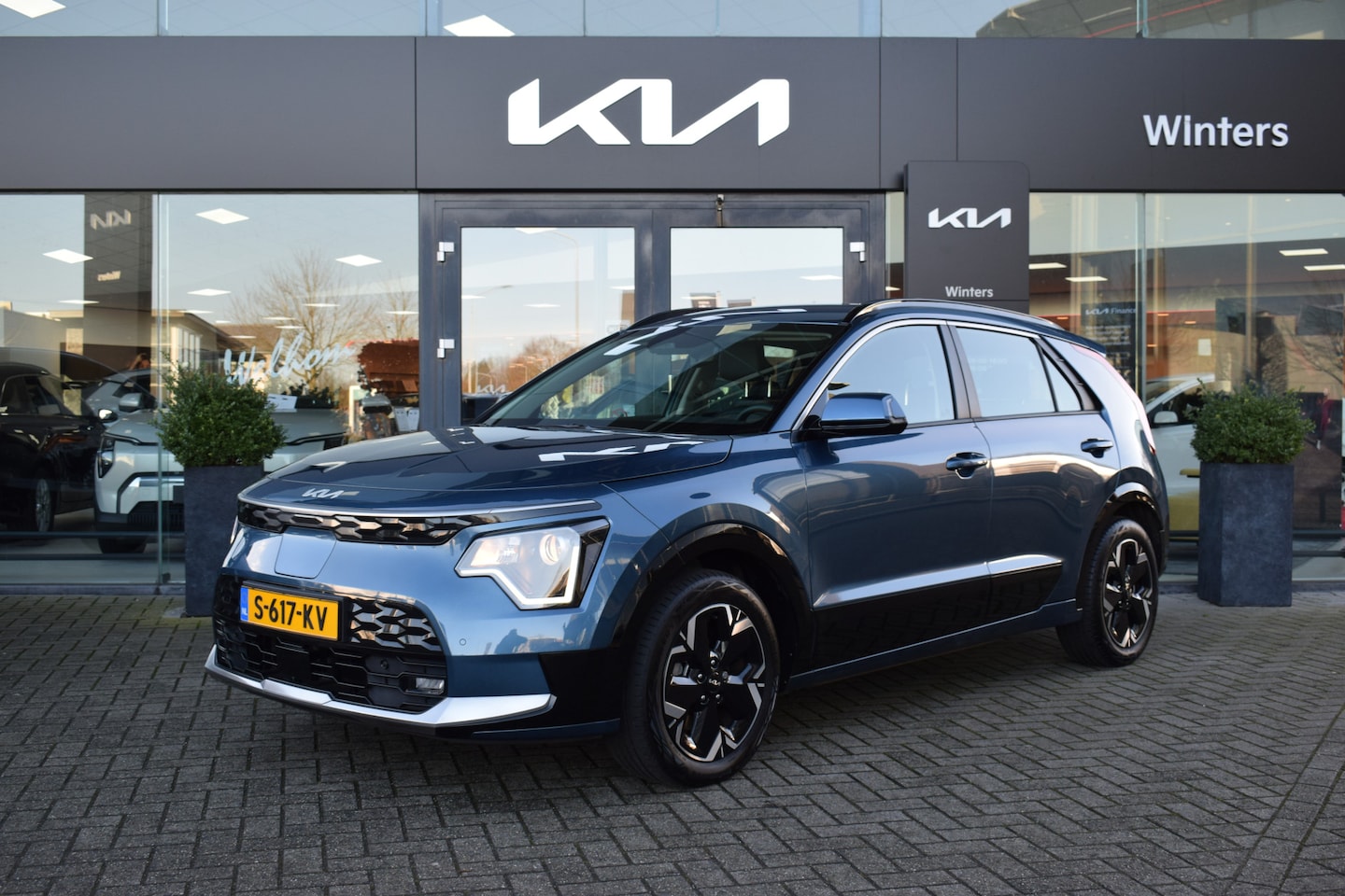 Kia Niro EV - DynamicLine 64.8 kWh ECC Cr.Control-Adapt. Navi+Camera BT+USB Keyless 17"LMV PDC Tot 10Jr. - AutoWereld.nl