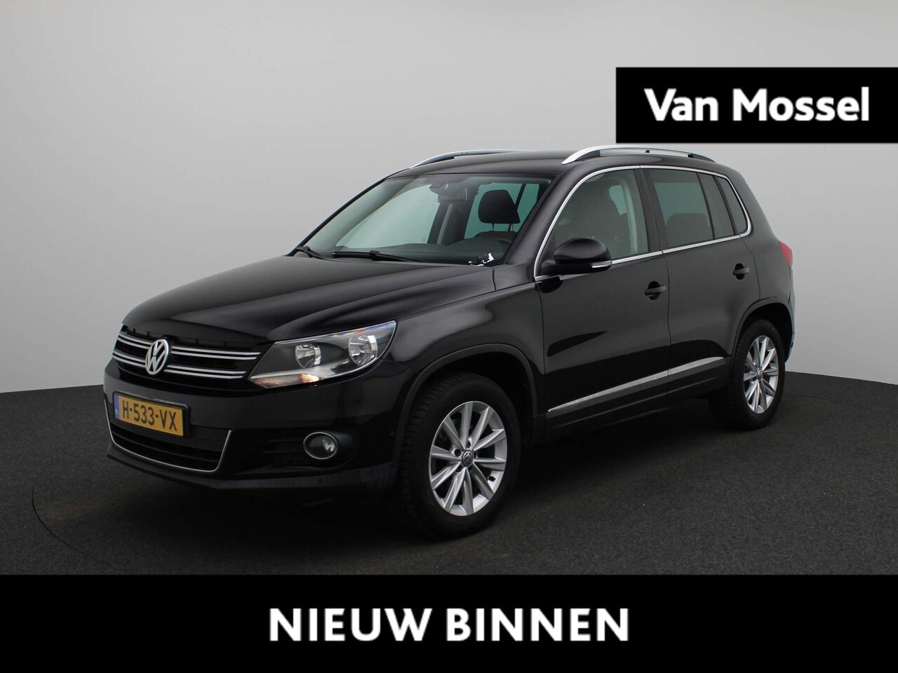 Volkswagen Tiguan - 2.0 TSI Sport&Style 4Motion | Climate Control | Stoelverwarming | Parkeersensoren | Lichtm - AutoWereld.nl