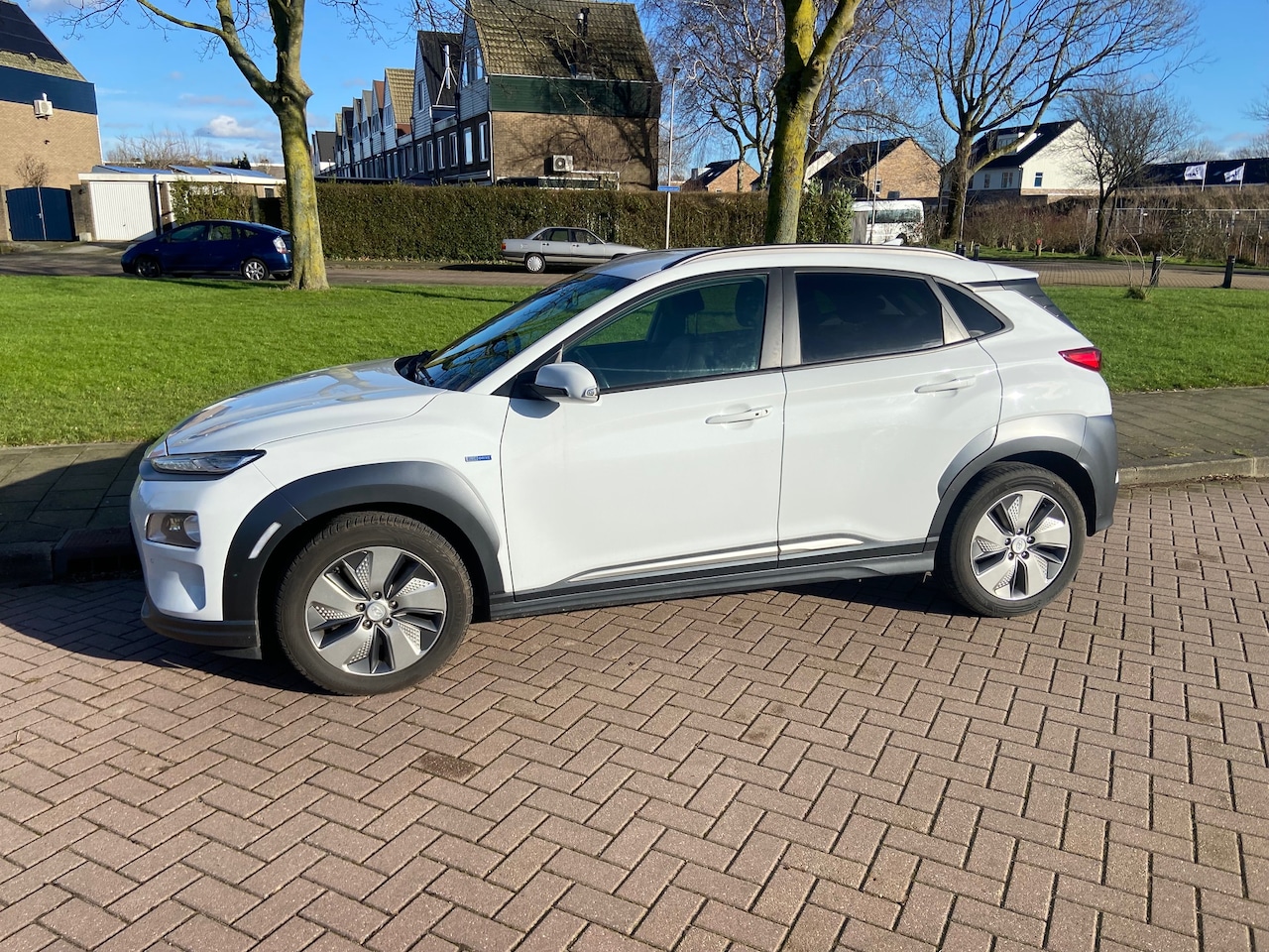 Hyundai Kona - EV Premium 64 kWh Nieuwe batterij, trekhaak - AutoWereld.nl