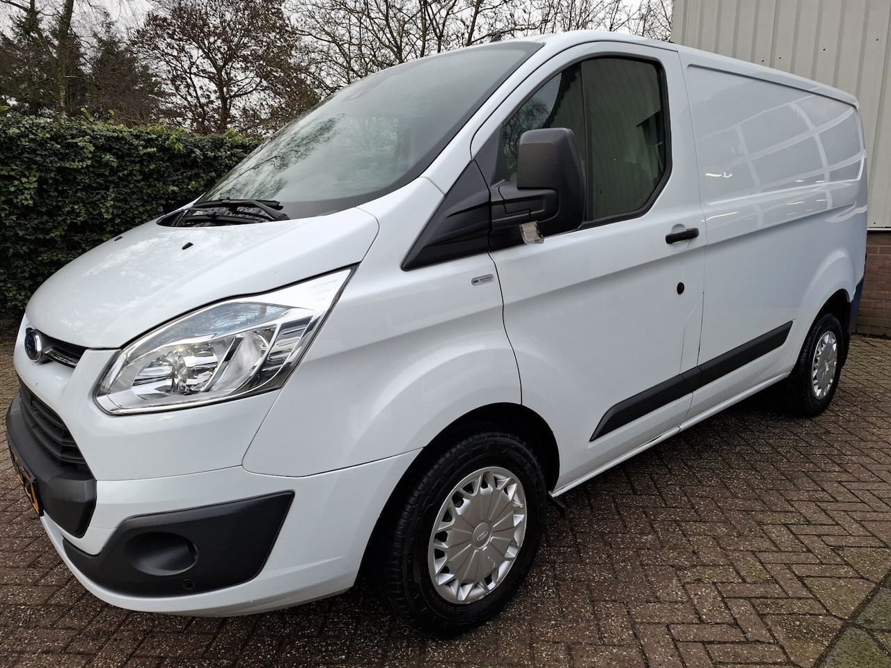 Ford Transit Custom - 270 2.2 TDCI L1H1 AIRCO/CRUISE/NAVI/PDC/TREKHAAK 100PK - AutoWereld.nl