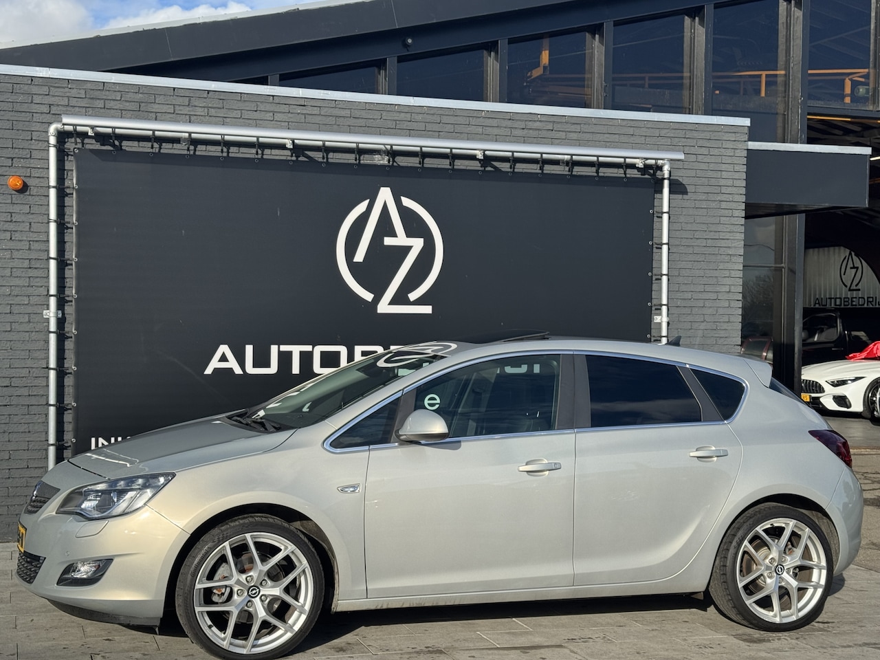 Opel Astra - 1.6 Turbo Cosmo AUTOMAAT! PANO! GROTE NAVI! - AutoWereld.nl