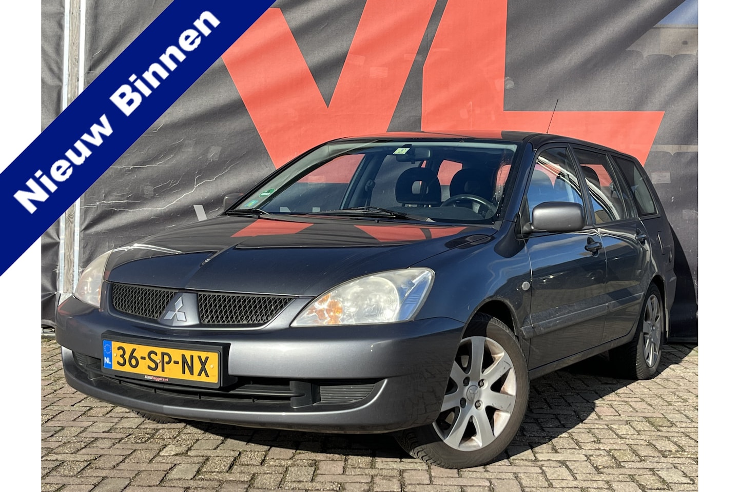 Mitsubishi Lancer Station Wagon - 1.6 Inform | Nieuw Binnen! | LPG | Airco | Radio CD - AutoWereld.nl