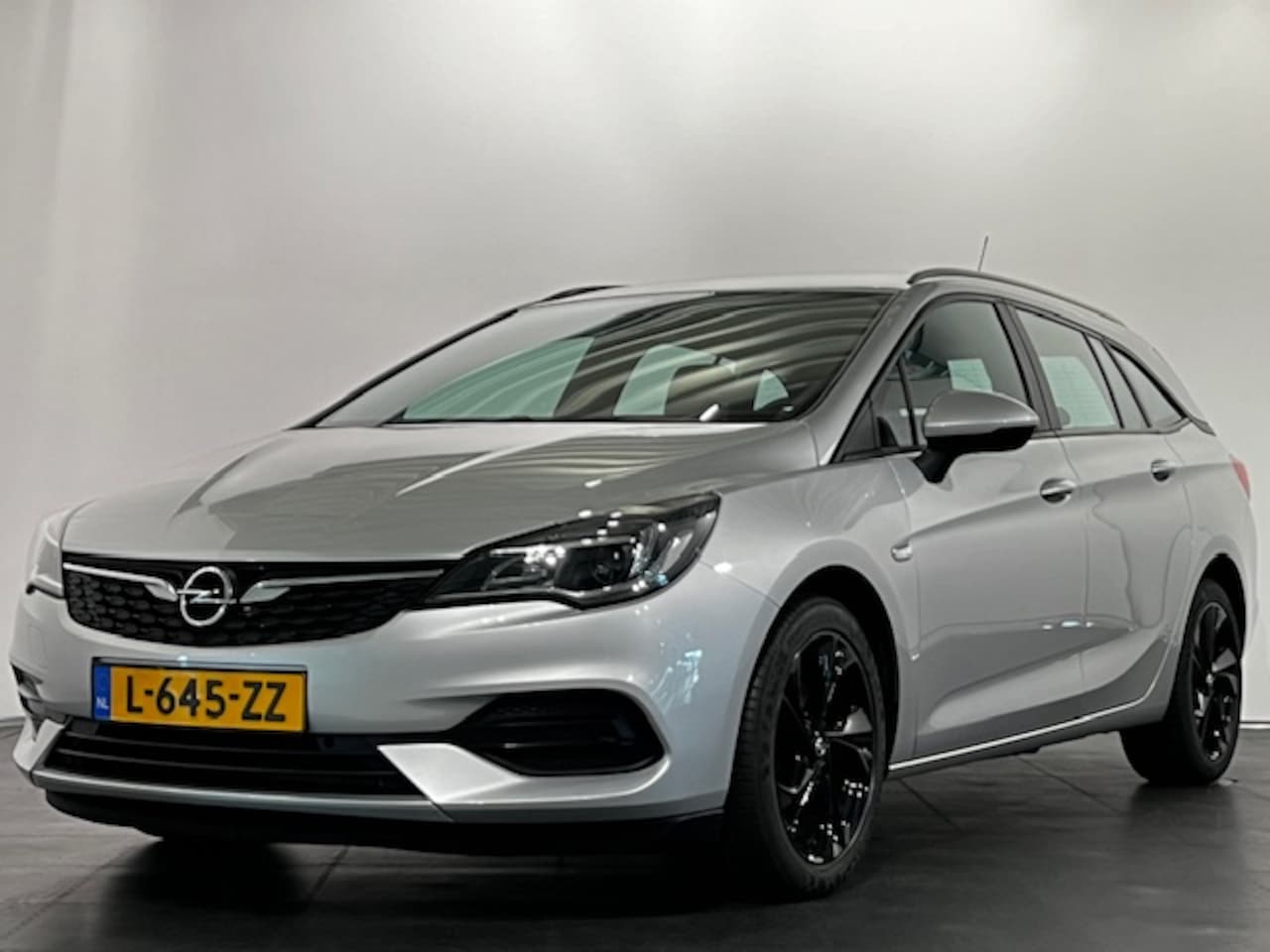 Opel Astra Sports Tourer - 1.4 Turbo 145pk Start/Stop Automaat Edition/navigatie - AutoWereld.nl