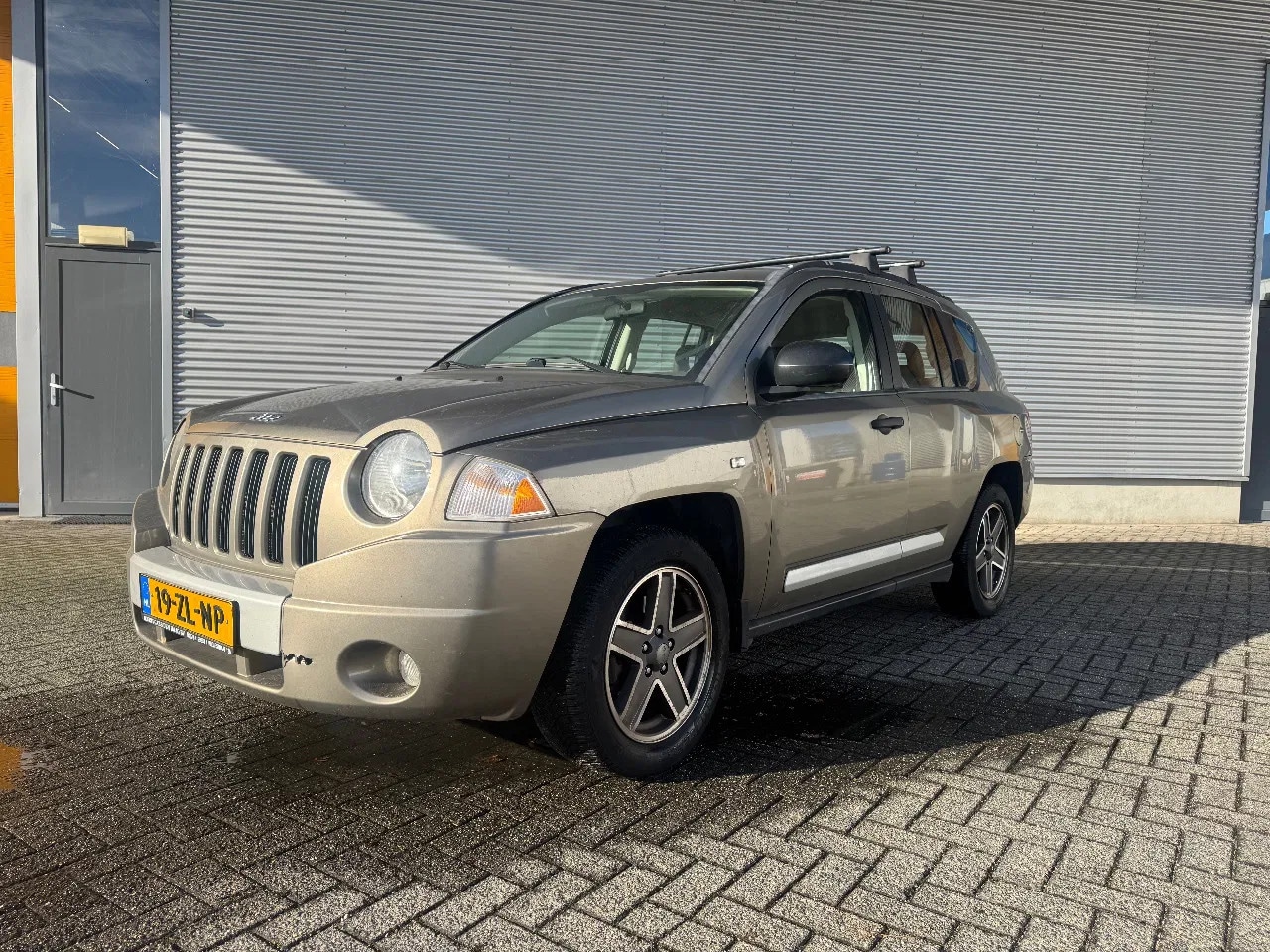 Jeep Compass - 2.4 Limited 4WD (4x4) Leder, Navi, Airco - AutoWereld.nl