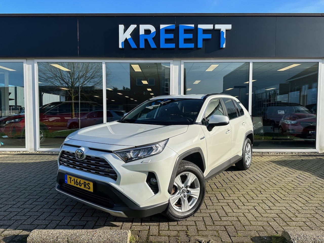 Toyota RAV4 - 2.5 Hybrid Parelmoer 1 jaar garantie. - AutoWereld.nl