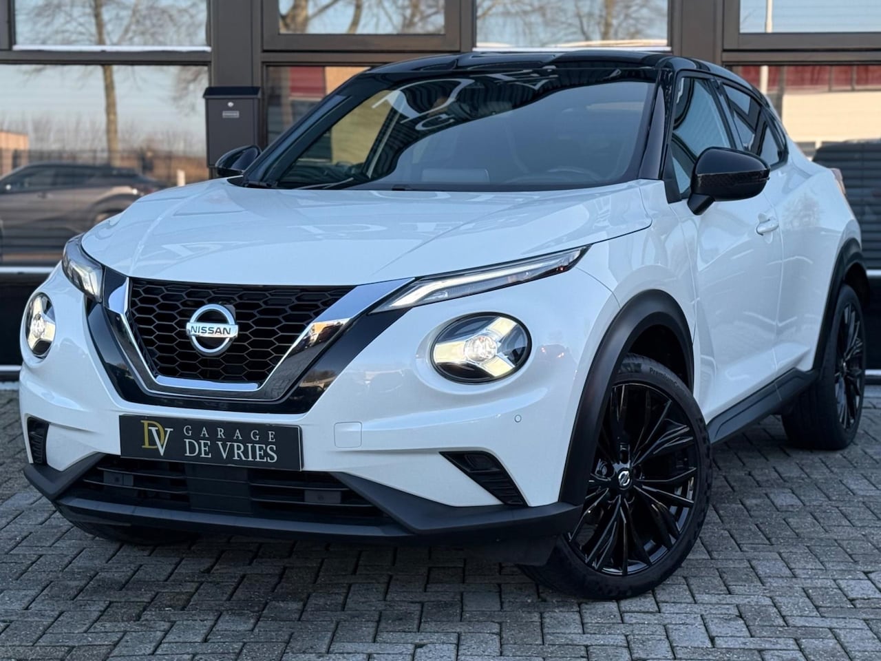 Nissan Juke - 1.0 DIG-T Enigma Automaat DCT Parelmoer Apple CarPlay Camera Garantie - AutoWereld.nl