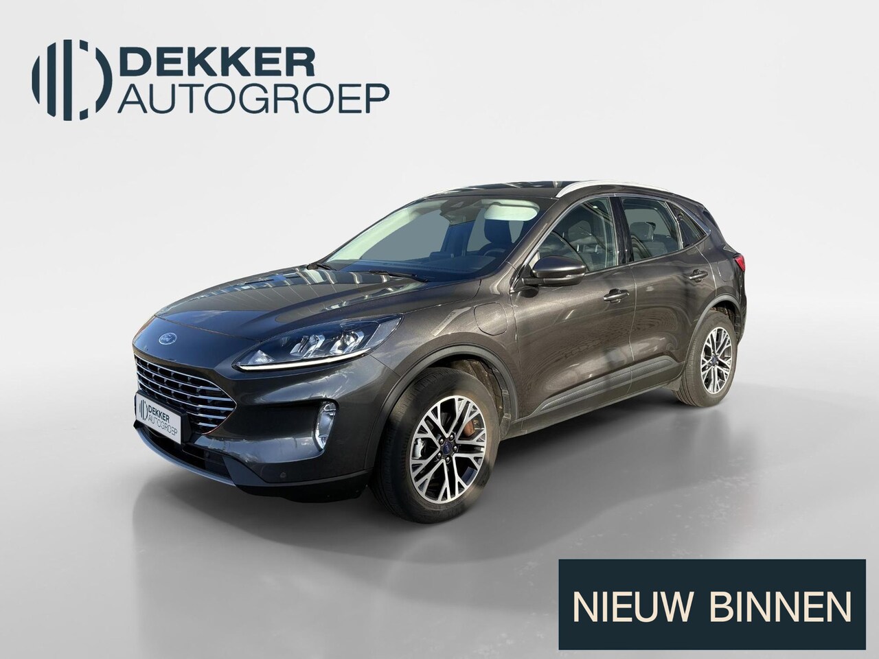 Ford Kuga - 2.5 PHEV Titanium I Winter Pack I Elektrische Achterklep I - AutoWereld.nl