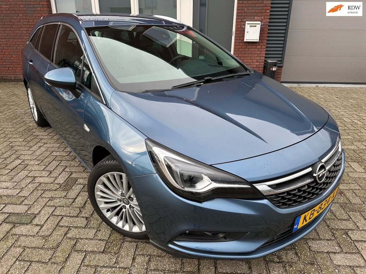 Opel Astra Sports Tourer - 1.0 Innovation / Navi / Leder / Camera / PDC - AutoWereld.nl