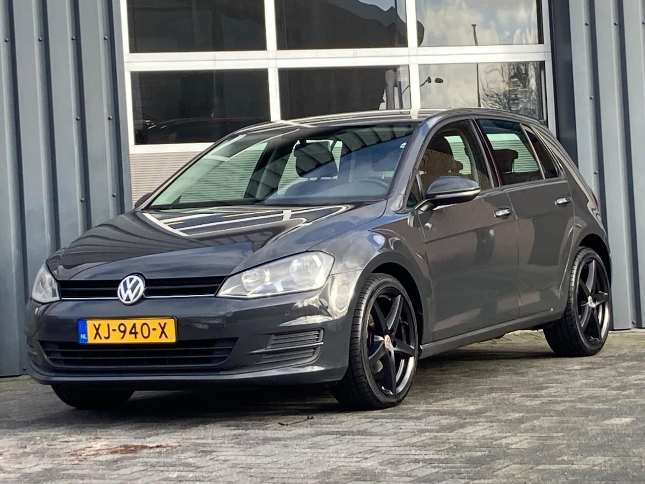 Volkswagen Golf - 1.2 TSI Airco Navigatie Pdc 18 inch - AutoWereld.nl