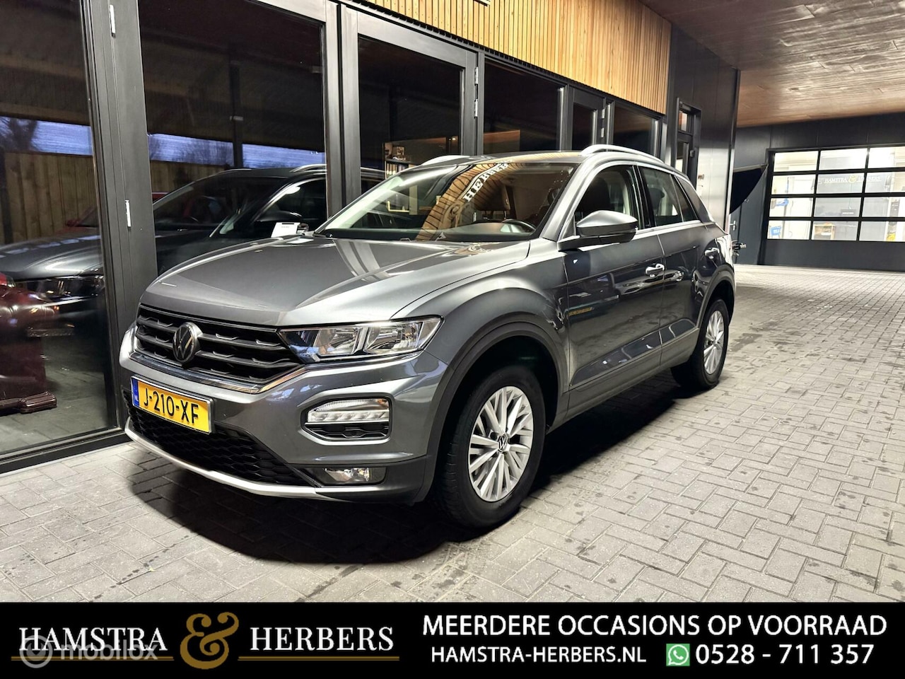 Volkswagen T-Roc - 1.5 TSI Style grijs - AutoWereld.nl