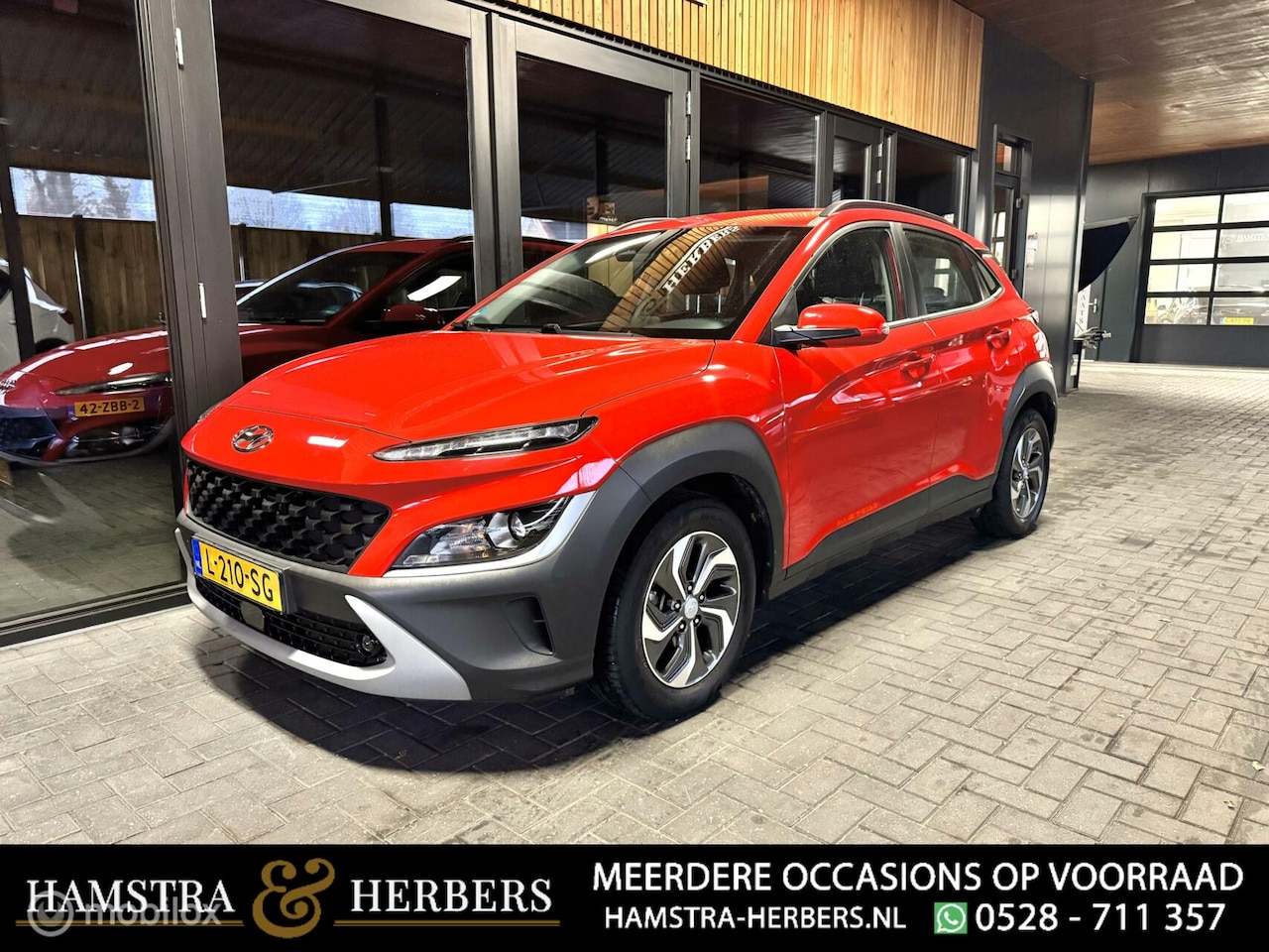 Hyundai Kona - 1.6 GDI HEV Comfort rood - AutoWereld.nl