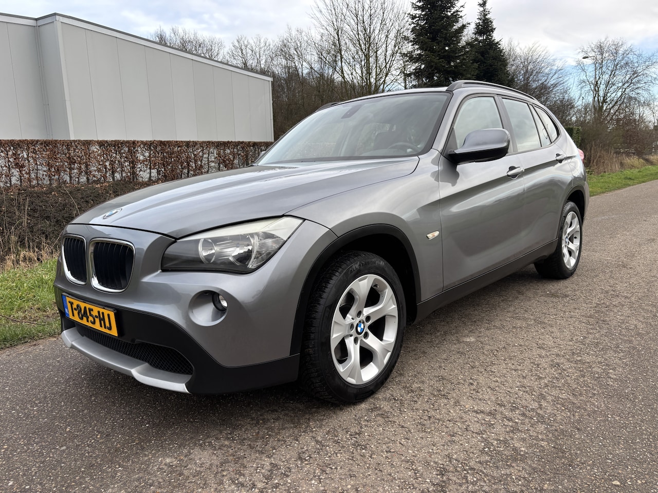 BMW X1 - sDrive18i Executive / NAVI / AIRCO ECC / CRUISE / 97dkm! - AutoWereld.nl