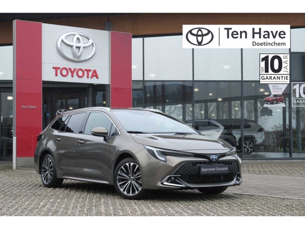 Toyota Corolla Touring Sports - 1.8 Hybrid 140PK Dynamic Automaat – 17” lichtmetalen velgen desi - AutoWereld.nl