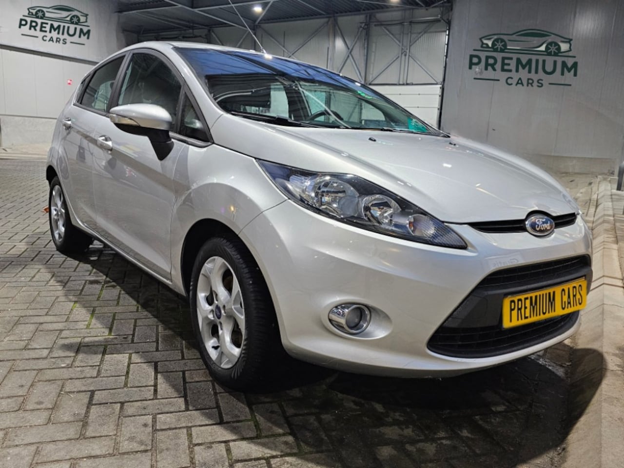 Ford Fiesta - 1.25 Titanium Airco / Clima / Metaal Velgen - AutoWereld.nl