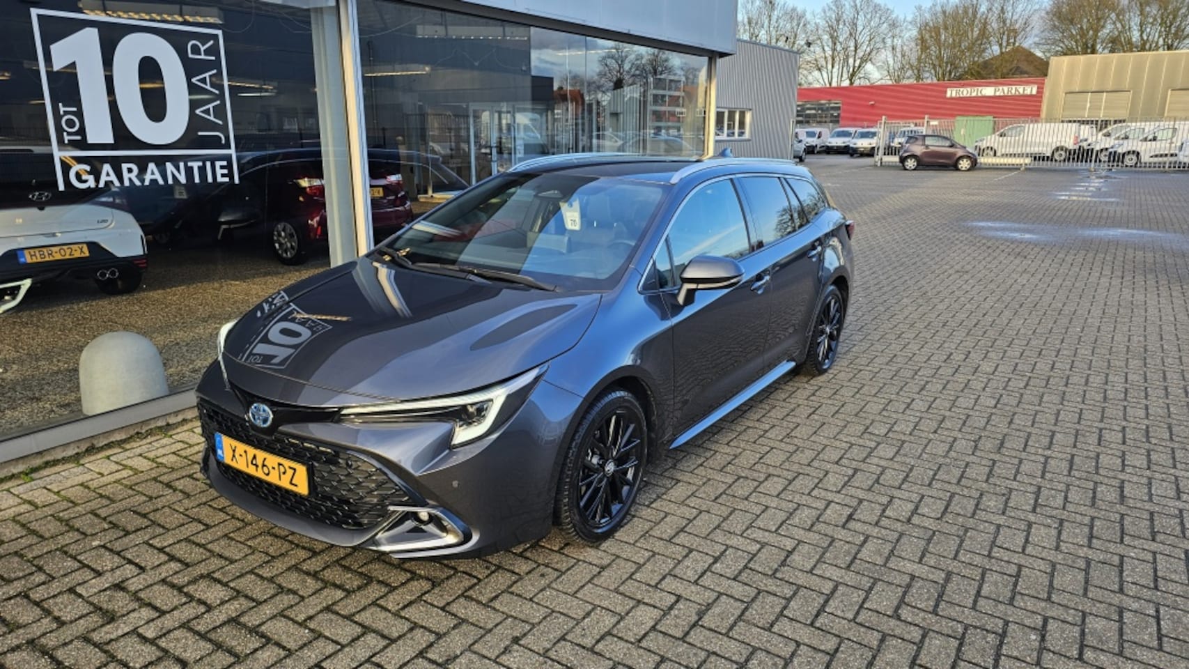 Toyota Corolla Touring Sports - 1.8 Hybrid 140 First Edition nieuw model NLauto | All-in | trekh - AutoWereld.nl